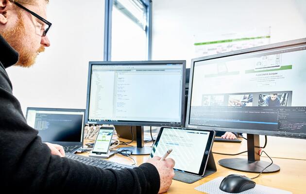 Software-Entwicklung mit der Plattform SharePoint.